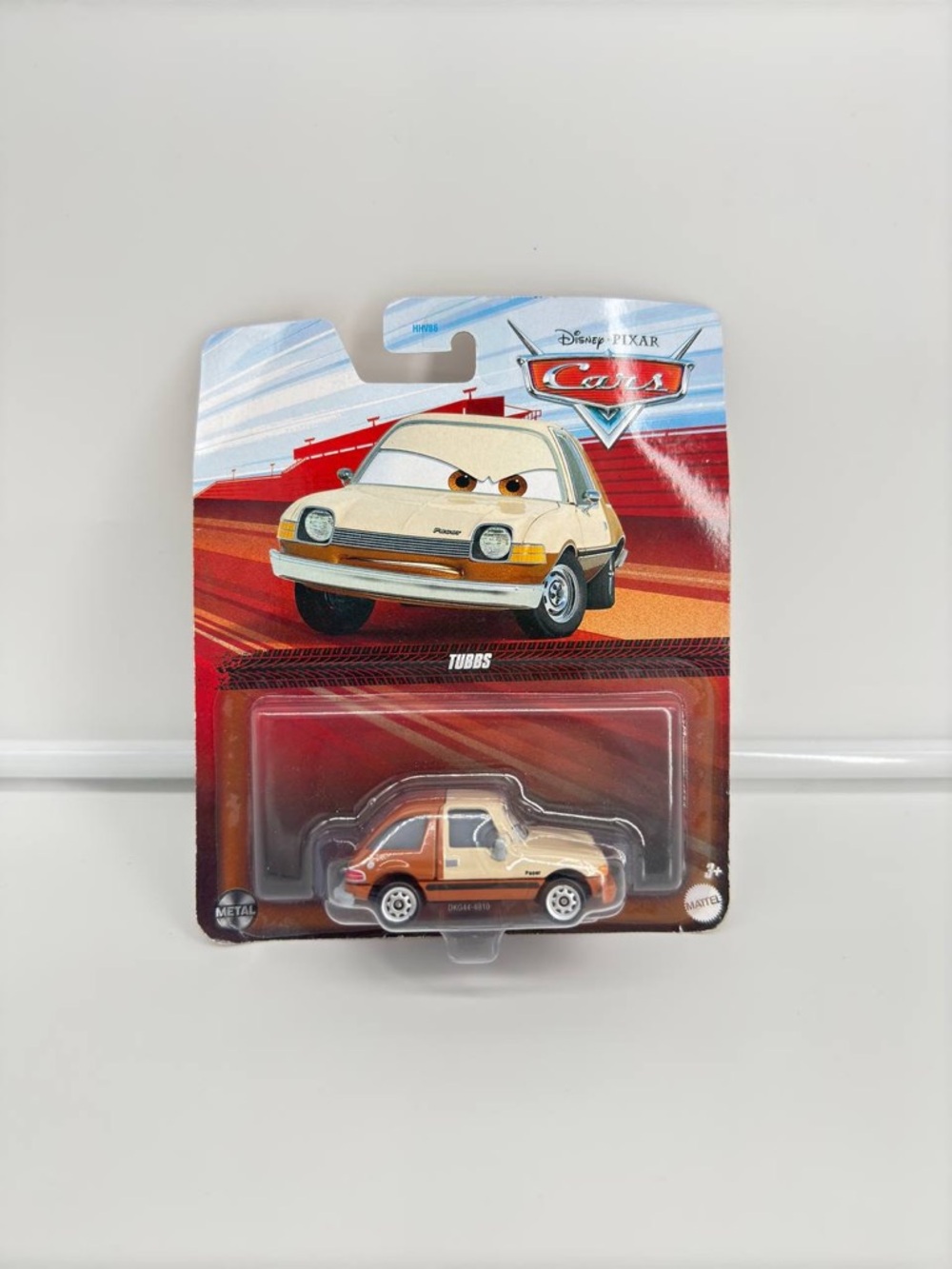 Mattel Disney Pixar Cars Tubbs Pacer Diecast Metal 1:55 Scale Tan Brown New